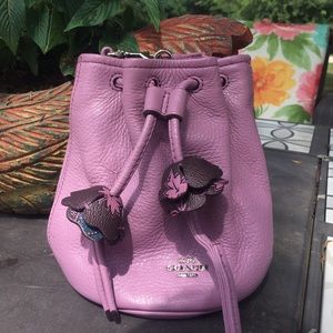 Coach lavender drawstring wristlet with flower detailing inside